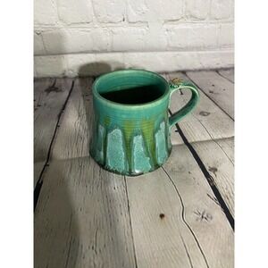 handmade green ceramic mug with maple leaf motive - signed by artist